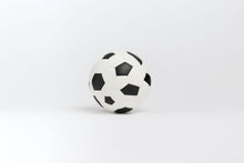 Load image into Gallery viewer, Black and white soccer ball on a light gray background