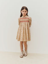 Load image into Gallery viewer, Melodia dress in Liberty fabric smocked and hand-embroidered in organic cotton