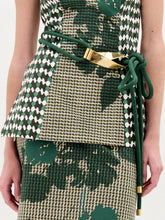 Load image into Gallery viewer, The Daiana Belt is a coiled dark green cord with gold metal caps and a large gold-plated brass buckle, crafted from fine Italian material and shown on a plain white background.