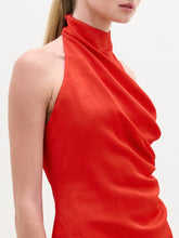 Load image into Gallery viewer, A person wearing the Dina Blouse in color Rouge on a white background.