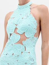 Load image into Gallery viewer, A person wearing the Mab Dress in color Turquoise on a white background.