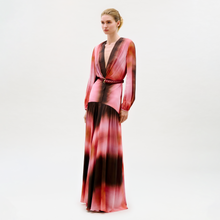 Load image into Gallery viewer, Woman wearing a long, patterned dress on a white background
