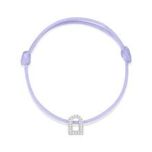 Load image into Gallery viewer, Introducing the L'Arc Voyage Charm PM, an exquisite piece from Paris Atelier. This bracelet features a delicate silk cord in light purple, adorned with an 18k white gold arch-shaped charm embellished with sparkling Galerie diamonds. It also includes adjustable knots on each side for a perfect fit.