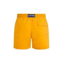 Load image into Gallery viewer, Swim shorts Water-reactive Starfish Art
