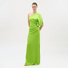 Load image into Gallery viewer, Woman wearing a bright green one-shoulder dress on a white background

