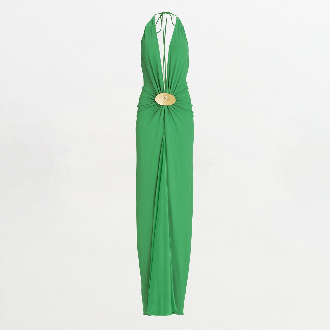 The Aiko Dress is a sleeveless green maxi in Italian fabric, featuring a halter neckline with deep V, gathered waist with round gold-tone buckle, and a floor-length skirt.
