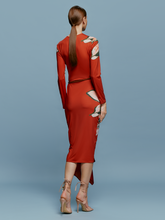 Load image into Gallery viewer, The model is wearing the Ananya Dress Red Floral Print.
