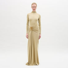 Load image into Gallery viewer, A woman wearing the Celinda Dress in color Gold  on a white background
