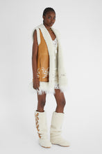 Load image into Gallery viewer, Shearling long waistcoat with handmade embroidery and fur on the bottom
