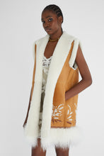 Load image into Gallery viewer, Shearling long waistcoat with handmade embroidery and fur on the bottom
