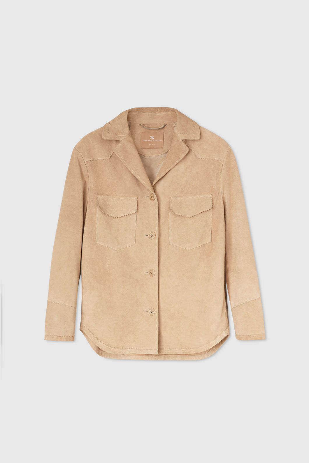 Single-breasted jacket in clouded suede with topstitching and broguing details.