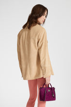 Load image into Gallery viewer, Single-breasted jacket in clouded suede with topstitching and broguing details.
