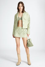 Load image into Gallery viewer, Nappa leather miniskirt with handmade geometric embroidery
