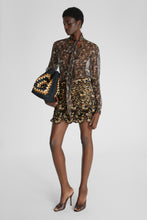 Load image into Gallery viewer, Macramé lace mini skirt with nude-coloured lining
