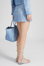 Load image into Gallery viewer, Denim miniskirt with devoré floral pattern
