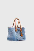 Load image into Gallery viewer, Medium Maggie in denim with handmade and hand-finished geometric cut-out
