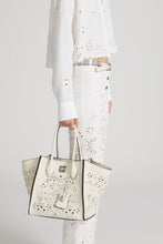 Load image into Gallery viewer, Medium Maggie in hammered calfskin with geometric carving made and finished by hand
