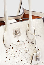 Load image into Gallery viewer, Medium Maggie in hammered calfskin with geometric carving made and finished by hand
