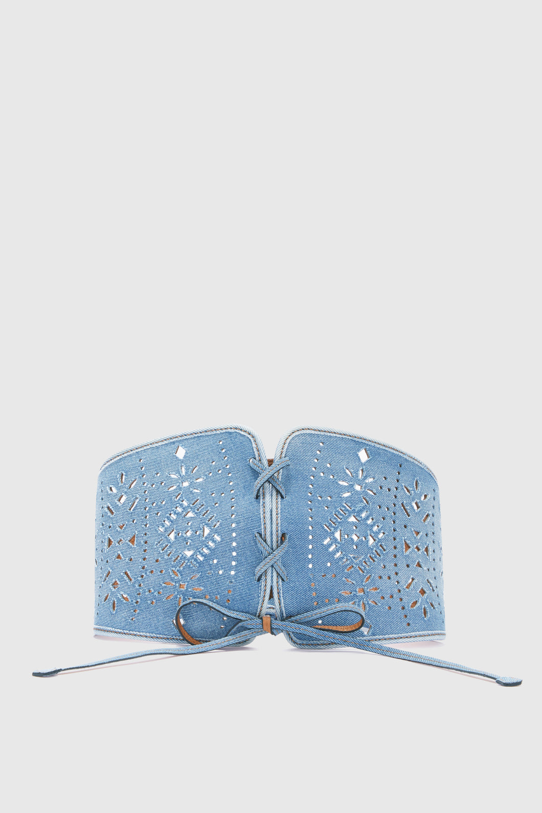 Denim corset with laces and geometric carving