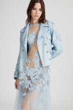 Load image into Gallery viewer, Denim print marocain biker jacket with adjustable drawstring at the back and hand-made floral embroidery
