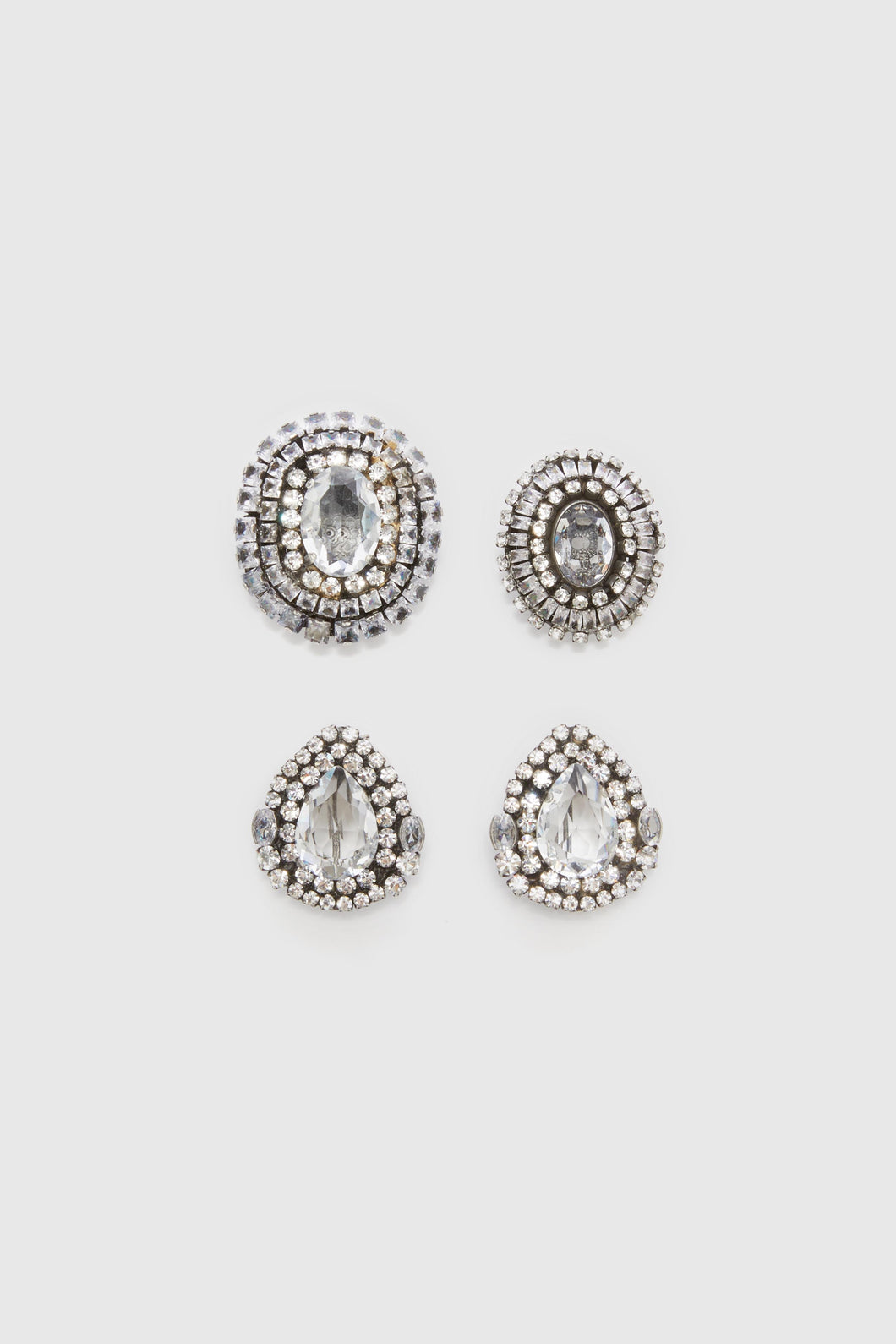 Set of Brooches with Oval Crystals