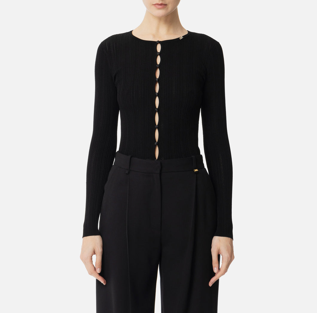 Ribbed top with decorative buttons