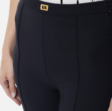 Load image into Gallery viewer, Crêpe bell-bottom trousers with logo plaque
