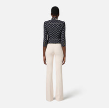 Load image into Gallery viewer, Crêpe bell-bottom trousers with logo plaque
