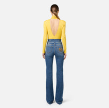 Load image into Gallery viewer, Bell-bottom stretch cotton jeans with central button placket
