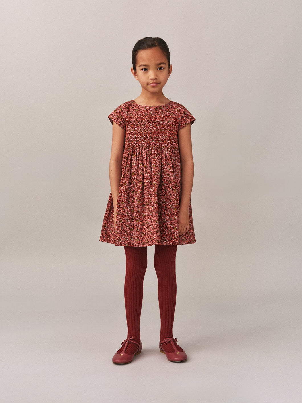 Smocked and embroidered Duchess dress in Liberty fabric in organic cotton