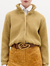 Load image into Gallery viewer, A blonde woman stands against a plain background wearing the Zalta jakcet in color Gold
